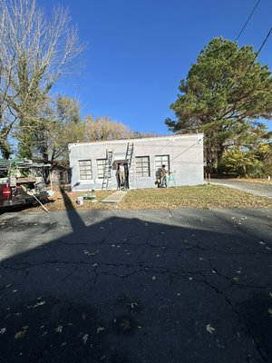 New exterior paint job - This paint job was done on a really old shop, new while color and black windows brought the shop back to life! New exterior paint job - This paint job was done on a really old shop, new while color and black windows brought the shop back to life!