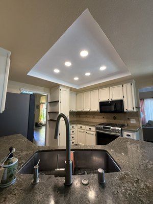 Kitchen lighting upgrade - Old lighting grid removed and upgraded with new 6-inch LED recessed lights for a cleaner, more modern look. Kitchen lighting upgrade - Old lighting grid removed and upgraded with new 6-inch LED recessed lights for a cleaner, more modern look.