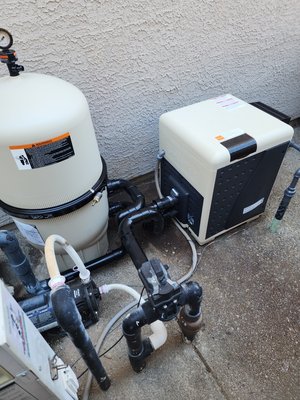 New Heater and Filter - Replaced the rusted out gas heater and the cracked filter which was leaking. New Pentair Mastertemp heater and a cartridge filter. New Heater and Filter - Replaced the rusted out gas heater and the cracked filter which was leaking. New Pentair Mastertemp heater and a cartridge filter.