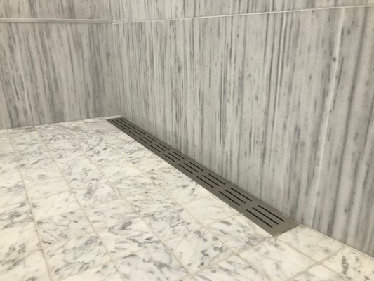 Markham Master Bathroom - This remodel was done on a 1980's subdivision home that was in need of an upgrade.  Expressrooter Plumbing rerouted the drains and water lines for a new vanity, new remote standalone jet tub, and for a curbless shower with linear drain, handheld and rain head shower.  We think it looks fabulous!  (and they can warm up the tub and start the jets from their phone!)
