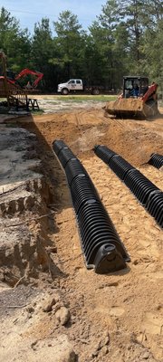 Septic Install done right - Rest assured that your septic system is in capable hands with our expert repair and restoration services. From minor glitches to major malfunctions, our skilled technicians diagnose and resolve issues promptly. We employ cutting-edge techniques and equipment to restore your system's functionality, ensuring seamless waste management and preserving the integrity of your property.