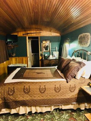 Book our Wild West Caboose - Step back int the wild wild west! With it's warm wood trim, brass bed and claw foot tub, you will feel like you are in another space in time. Book our Wild West Caboose - Step back int the wild wild west! With it's warm wood trim, brass bed and claw foot tub, you will feel like you are in another space in time.