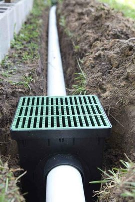 Drainage System - Understanding Drainage Problems & Solutions with Texas Urban Elements
Common Drainage Problems in Texas Yards
Poor drainage can lead to numerous issues for homeowners, ranging from standing water to foundation damage. At Texas Urban Elements, we frequently encounter drainage problems caused by:

Improper Slope & Grading: When the land around a home is not correctly leveled, water pools instead of flowing away.
Clogged or Ineffective Drainage Systems—Old or poorly installed drainage pipes can become debris-caused, preventing water from draining correctly.

Roof Runoff and Gutter Problems: Rainwater can pool around the foundation and yard without seamless gutters or proper downspout extensions.

Soil Composition & Compactness—Clay-heavy soils, common in Texas, often struggle to absorb water, leading to excess surface runoff.

Lack of Proper Drainage Infrastructure: Homes without a swale, French drains, or catch basins may experience excessive flooding after heavy rains.

Custom Drainage Solutions by Texas Urban Elements
At Texas Urban Elements, we provide expert landscaping, hardscaping, and drainage solutions to eliminate standing water and prevent long-term damage. Our team takes a strategic approach and uses certified techniques and state-of-the-art equipment to ensure lasting results.

Our Drainage Solution Process
Comprehensive Site Evaluation

Our experienced landscapers assess the yard’s natural slope, soil condition, and water flow patterns.
We utilize precision tools to identify problem areas where water accumulates.
Strategic Land Leveling & Grading

We regrade the land, ensuring a natural slope directs water away from structures and low-lying areas.
We elevate and reshape problem areas using heavy-duty tools to improve drainage efficiency.
Installation of Custom Drainage Systems
Depending on the severity of the drainage issue, we install the most effective system, including:

French Drains: Subsurface drains that redirect water through perforated pipes and gravel.
Channel Drains: Linear drainage systems are placed on patios, driveways, or pool decks to prevent flooding.
Catch Basins & Swales – Designed to collect excess water and direct it to a proper outlet.
PVC Drainage Systems: High-performance underground pipes that connect gutter downspouts to storm drains.
Downspout Extensions – Seamless gutters and pop-up drains to channel water away from the foundation.
Adding Drainage-Friendly Hardscaping Elements

We integrate gravel beds, stone pathways, and pavers for proper water filtration.
Our retaining walls and border designs help manage water flow and prevent erosion.
Final Touches: Landscaping & Aesthetic Integration

We finish each project with sod installation, plant beds, and mulch to improve water absorption.
Our expert landscapers ensure a seamless blend between function and beauty, creating a backyard that is both drainage-efficient and visually stunning.

Why Choose Texas Urban Elements?
✅ Certified & Licensed – We are trained professionals in landscaping, hardscaping, and drainage solutions.
✅ Comprehensive Approach – We solve the problem at the source, not just the symptoms.
✅ One-Year Warranty – A one-year craftsmanship warranty backs our drainage work for quality assurance.
✅ Seamless Integration – We ensure all drainage work enhances the functionality and appearance of your outdoor space.