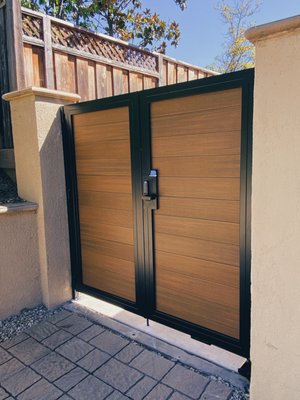 Modern Composite Pedestrian Gate with Keypad Access | Sleek & Durable - Explore our modern composite pedestrian gate featuring a sleek design and secure keypad access. Built with durability and contemporary style in mind, this gate is perfect for enhancing both security and aesthetics of your property. Ideal for modern homes and commercial spaces. Explore high-quality pedestrian gates on our website at resoluteiw.com Modern Composite Pedestrian Gate with Keypad Access | Sleek & Durable - Explore our modern composite pedestrian gate featuring a sleek design and secure keypad access. Built with durability and contemporary style in mind, this gate is perfect for enhancing both security and aesthetics of your property. Ideal for modern homes and commercial spaces. Explore high-quality pedestrian gates on our website at resoluteiw.com
