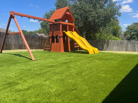 Playscapes - Spending time outdoors with your family is so much easier with artificial turf! Not only does it look great, it feels great for kiddos who are prone to falling or running around barefoot! If your children suffer from grass allergens, artificial turf is the perfect solution so they can play safely outside again! No matter how rough your kids can be on your grass, their play is no match for turf! Contact us today for a FREE estimate! Playscapes - Spending time outdoors with your family is so much easier with artificial turf! Not only does it look great, it feels great for kiddos who are prone to falling or running around barefoot! If your children suffer from grass allergens, artificial turf is the perfect solution so they can play safely outside again! No matter how rough your kids can be on your grass, their play is no match for turf! Contact us today for a FREE estimate!