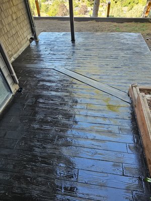 stamped concrete wood plank - This is a concrete wood plank patio.Color Charcoal