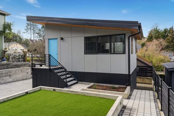 Madrona DADU - This two level 686 square foot detached accessory dwelling unit in Seattle’s Madrona neighborhood was built in conjunction with a new residence on the property for the owners.  The DADU is intended for use by extended family and includes an open main level living space with a lower level bedroom, bathroom and laundry area.