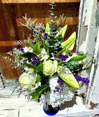 Beauty in Blue - This arrangement was made for a client. The client picked out an arrangement off our sample page. Called and ordered they also asked for delivery which is provided all over Jacksonville and the surrounding areas. Beauty in Blue - This arrangement was made for a client. The client picked out an arrangement off our sample page. Called and ordered they also asked for delivery which is provided all over Jacksonville and the surrounding areas.