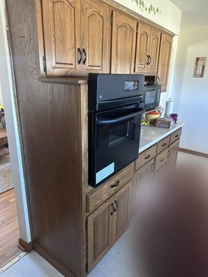 Wall Oven and Cabinet Customizing - We tore out the old outdated and unusable oven that was there. We were able to save all the cabinets and drawer space with a few adjustments and precise measurements. And before you know it she was ready to make pies in the new equipment. Wall Oven and Cabinet Customizing - We tore out the old outdated and unusable oven that was there. We were able to save all the cabinets and drawer space with a few adjustments and precise measurements. And before you know it she was ready to make pies in the new equipment.