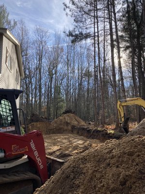 Addition Excavation - Excavation for an addition. Excavation for footings, crawl space, backfill, compacting, and grading. Addition Excavation - Excavation for an addition. Excavation for footings, crawl space, backfill, compacting, and grading.