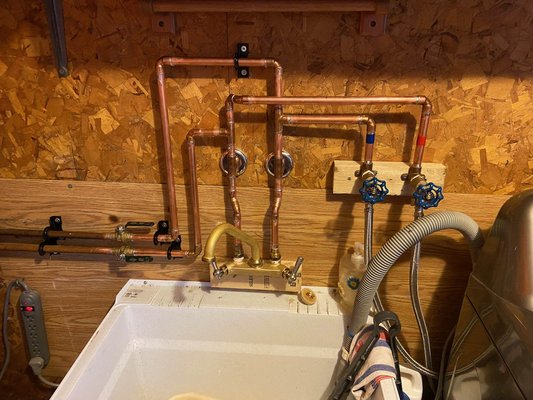 Laundry Tub faucet replacement - Laundry tub faucet replacement, very tight spot to solder next to chip board but we got it done. Customer was very pleased. Laundry Tub faucet replacement - Laundry tub faucet replacement, very tight spot to solder next to chip board but we got it done. Customer was very pleased.