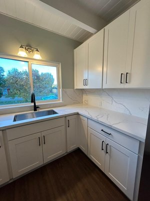 Kitchen Remodeling 2024 - This remodel was done on an old kitchen that was in bad shape. We gutted it and put in new cabinets and appliances . Replacing the flooring in the kitchen and dining area . Painted the walls in light green.