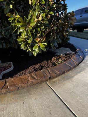 Bed refresh and Curb install - 110 linear ft. of natural stone curb and fresh mulch. Bed refresh and Curb install - 110 linear ft. of natural stone curb and fresh mulch.