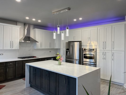 LED Lights For Your Kitchen - Make your new kitchen look futuristic with some of the features we offer here at Abc Home Expert. 

Adding LED lights under your cabinets or countertop can really help you set the tone of your environment. Whether you're looking for something calming or fun, these lights can be easily controlled by a remote and there are many colors to choose from. 

We also offer lift technology that can be installed to your kitchen counter