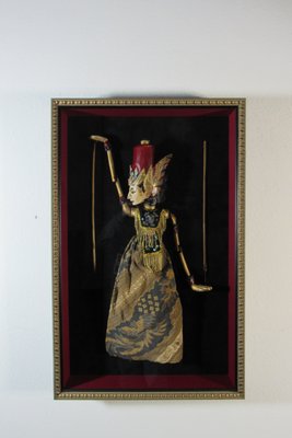 Shadow Box Framing - This is a very old wooden puppet from Bali.  Customer wanted to preserve it for future generations to enjoy.