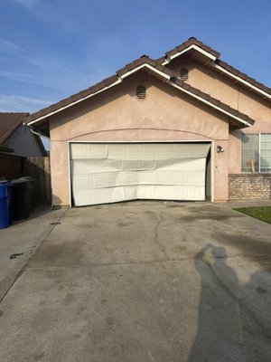 Removed damaged garage door and installed new door with smooth operation, proper alignment, and full safety check. Customer in Dinuba - Removed damaged garage door and installed new door with smooth operation, proper alignment, and full safety check. Customer in Dinuba