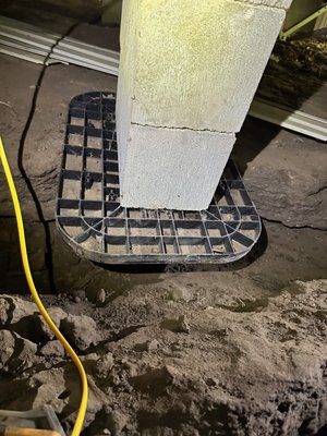 Water Channeling Repair and Relevel - This customer had actually been underneath his home and had seen this and decided it was too much for him to try and tackle. The home didn't have any gutters or downspouts and was at the lower end of a grade. Water had come off the roof, we suspect, and over years eroded a channel that flowed underneath the interior frame rail of the home. After this lift, most of the blocks pictured fell into the hole created. In order to remediate, we had to dig down and aroundthe block settings to get a flat surface to rest the pier pad on. 7 Piers in total required this remediation. We suggested to the customer that gutters, downspouts and a french drain would need to be installed to prevent this damage from occurring again at a later date. Water Channeling Repair and Relevel - This customer had actually been underneath his home and had seen this and decided it was too much for him to try and tackle. The home didn't have any gutters or downspouts and was at the lower end of a grade. Water had come off the roof, we suspect, and over years eroded a channel that flowed underneath the interior frame rail of the home. After this lift, most of the blocks pictured fell into the hole created. In order to remediate, we had to dig down and aroundthe block settings to get a flat surface to rest the pier pad on. 7 Piers in total required this remediation. We suggested to the customer that gutters, downspouts and a french drain would need to be installed to prevent this damage from occurring again at a later date.