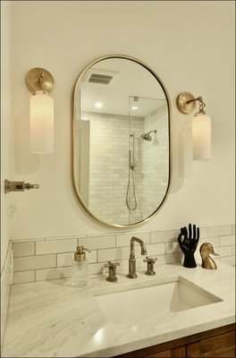 2023  Bathroom renovation - This three-bathroom renovation on Germantown Road in NW Portland brings a luxurious spa-like feel to each space with carefully curated details. Marble tile graces the floors and walls, adding timeless elegance and a sense of serenity. The curbless showers provide a seamless, modern look and enhanced accessibility, while custom cabinetry adds both style and functional storage. Thoughtfully designed lighting highlights the fine materials and craftsmanship, creating a warm, inviting ambiance in every bathroom. This renovation reflects a commitment to quality and sophisticated design, transforming these bathrooms into beautiful, functional retreats.