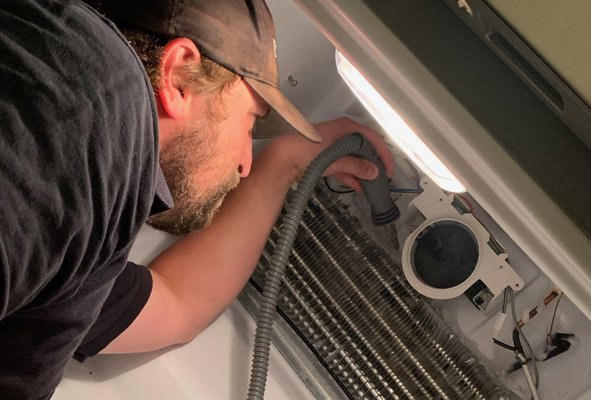 Refrigerator/ Freezer Repair - This Kitchen Aid French Door Bottom Mount Freezer needed its evaporator fan motor replaced. The motor was failing and the spindle was rambling while the motor is spinning.
