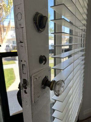 Door Retrofit Project - This old house in Long Beach had the original entry door and lock set, approximately 100 years old. The lock was literally falling off the face of the door. I removed the old mortise body lock, retrofit with new holes to accommodate a modern knob lock. When finished, the new lock worked smoothly. The landlord and tenant were very happy! Door Retrofit Project - This old house in Long Beach had the original entry door and lock set, approximately 100 years old. The lock was literally falling off the face of the door. I removed the old mortise body lock, retrofit with new holes to accommodate a modern knob lock. When finished, the new lock worked smoothly. The landlord and tenant were very happy!
