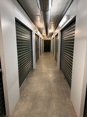 Climate Controlled Units - Our facility features climate-controlled unit is inside air-conditioned buildings that are perfect for storing your valuables! These specialty units offer heating and air conditioning - depending on the time of the year - to maintain a constant temperature inside the unit.
Why should you consider a climate-controlled unit? If you’re storing anything that might be damaged by constantly changing temperatures, such as anything that swells in the heat or shrinks in the cold, a climate-controlled storage unit is vital. Humidity can cause mold and mildew to grow on cloth, wood, and other materials. A climate-controlled storage unit keeps the humidity within from getting out of control, keeping your stuff safe.
If you’re not sure what type of storage unit you need, our friendly storage experts are happy to help you choose! Climate Controlled Units - Our facility features climate-controlled unit is inside air-conditioned buildings that are perfect for storing your valuables! These specialty units offer heating and air conditioning - depending on the time of the year - to maintain a constant temperature inside the unit.
Why should you consider a climate-controlled unit? If you’re storing anything that might be damaged by constantly changing temperatures, such as anything that swells in the heat or shrinks in the cold, a climate-controlled storage unit is vital. Humidity can cause mold and mildew to grow on cloth, wood, and other materials. A climate-controlled storage unit keeps the humidity within from getting out of control, keeping your stuff safe.
If you’re not sure what type of storage unit you need, our friendly storage experts are happy to help you choose!