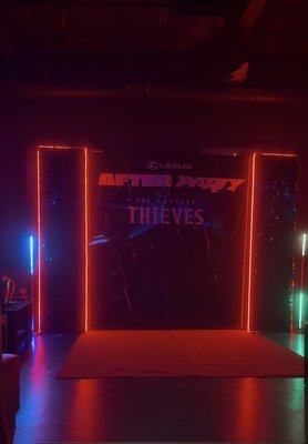 Lexus Sponsored Esports After Party – Custom Corporate Event Backdrop | Dallas, TX - When we received the call to design a Lexus-sponsored esports after party, the timeline was tight and the expectations were high.
This wasn’t just party décor — this was a corporate brand activation event for a professional esports team, requiring a premium, high-impact custom backdrop that aligned with luxury branding and nightlife energy.
The Objective
Create a bold, immersive step-and-repeat style entrance installation that felt modern, elevated, and photo-ready — perfect for sponsor visibility, VIP guests, and social media content.
Our Approach
With quick turnaround time, our team at DFW Backdrops immediately moved into production:
• Custom backdrop design
• LED light integration
• Vinyl logo production
• Luxury marble-style panel finishing
• On-site event installation
• Professional delivery, setup & breakdown
We designed sleek black marble panels framed with precision-installed red LED lighting to create a dramatic “portal entrance” effect — perfect for a high-energy esports after party atmosphere.
Strategic brand placement ensured Lexus’ sponsorship presence felt clean, modern, and premium — not overcrowded.
The result was a photo-ready corporate event backdrop in Dallas that became one of the most photographed moments of the night.