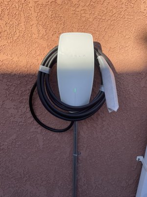 Tesla Charger Installation - Tesla Charger installed 32” feet of emt pipe used from panel to charger
