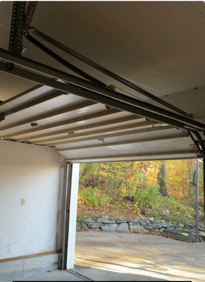 Original door with the old track and old spring system - Call today for a quick estimate 

Your garage door should add safety, not stress. We focus on clear communication, honest pricing, and dependable service, so every repair, installation, or tune-up gives you confidence your home is secure and worry-free.
