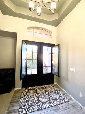 Double Exterior Iron Doors - Pre-hung Double Iron Door made from high quality 12 gauge and solid steel scroll work. All doors are fully foam insulated including the frame and have a welded threshold built in. This door comes with a standard deadbolt, pull handles and magnetic bug screens. The operable glass allows you to keep the door closed and open the glass panel independently. Let that nice breeze in the house while keeping the bugs out. All doors have low-e, dual pane, tempered glass to increase the amount of insulation. Our doors are complete with all seals, weather stripping and are finished with a strong enamel based paint that will not rust or fade overtime.

HOW OUR PRODUCTS ARE MEASURED

Our sizes are measured from outside of jamb to outside of jamb. For example, a 72” x 96” door listed on our website means that 72” is the width from outside to outside of jamb (not the actual width size of the door) and 96” is the height from outside of jamb to bottom of the threshold (not the actual height of the door).

We recommend the rough opening be 1” wider and 1” taller than the door size ordered to give the installer enough room to comfortably position the jamb into place and make sure it is leveled.

JAMB/FRAME/THRESHOLD

The Jamb/Frame is included with every door and prehung.  The jamb is constructed with 12 gauge tube (above industry standard) and Polyurethane Foam Core is filled in the jamb and doors for greater insulation. A steel threshold is included and comes welded on the jamb.

HINGES

Steel Bullet hinges with grease fittings and copper crush washer come welded on the jamb and door. Each heavy duty hinge can hold up to 1000lbs which allows customers to comfortably open and close the doors.

FLUSH LATCH

The upper and lower sections of the secondary door have pre-installed flush latches to allow both doors to open and operate while in the unlocked position.

WEATHER STRIPPING

Dual foam weather stripping is included and comes installed around the door frame as well as a bottom rubber door sweep.  Designs with operable glass will have dual sealing around the glass.  The purpose is to help reduce air infiltration and water penetration.  The dual sealing around the glass allows for weather stripping on both sides of the glass.