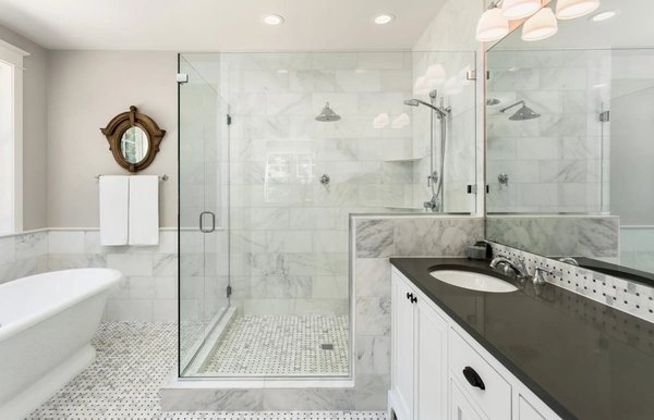 Bathroom Remodeling - or this stunning bathroom remodel and painting project, we began by carefully removing the old fixtures, tiles, and cabinetry to make way for an updated design. We installed modern, water-efficient fixtures, including a sleek rainfall showerhead and a contemporary freestanding tub. High-quality porcelain tiles were expertly laid to create a visually appealing pattern on both the floor and walls.

To complement the bathroom's new look, we painted the walls and ceiling in a soothing, neutral hue, skillfully selecting a paint that is resistant to moisture and mildew. The choice of paint color enhanced the overall ambience, creating a serene and inviting atmosphere. The project was completed with utmost precision, ensuring the homeowner's satisfaction with our craftsmanship and attention to detail. Experience the transformation of this beautiful bathroom remodel and painting project - a perfect example of our commitment to excellence.