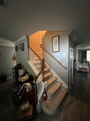 Staircase remodel - This remodel was done of an old stairway that had carpet and sheet rock railings, we started by removing the old carpet and knocking down the old sheet rock wall, then proceeded to adding stain boards with a semi gloss varnish, and making a custom metal railing for the customer Staircase remodel - This remodel was done of an old stairway that had carpet and sheet rock railings, we started by removing the old carpet and knocking down the old sheet rock wall, then proceeded to adding stain boards with a semi gloss varnish, and making a custom metal railing for the customer