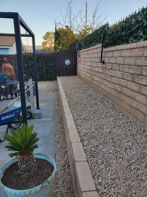 Backyard Assistance - We had recieved a call from a customer who needed the rock she ordered layed out in the back yard. It was no problem. We went ahead and shoveled the rock into the requested area and these are the finishing results. Give us a call anytime 661-227-2080 Backyard Assistance - We had recieved a call from a customer who needed the rock she ordered layed out in the back yard. It was no problem. We went ahead and shoveled the rock into the requested area and these are the finishing results. Give us a call anytime 661-227-2080