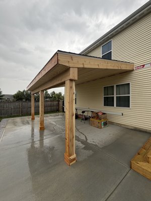 covered structure - This custom covered patio was designed and built to create a functional outdoor living space for year-round enjoyment. The project features a lean-to style roof, cedar structural posts and beams, tongue-and-groove ceiling detail, integrated gutter system, and a clean modern design built to complement the home. Davis Remodels LLC specializes in high-quality outdoor living projects built with craftsmanship, durability, and attention to detail. covered structure - This custom covered patio was designed and built to create a functional outdoor living space for year-round enjoyment. The project features a lean-to style roof, cedar structural posts and beams, tongue-and-groove ceiling detail, integrated gutter system, and a clean modern design built to complement the home. Davis Remodels LLC specializes in high-quality outdoor living projects built with craftsmanship, durability, and attention to detail.