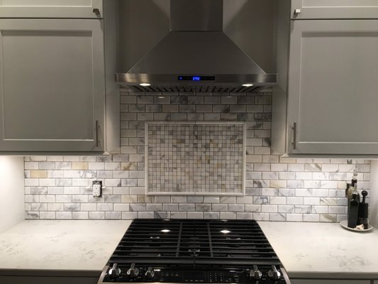Marble Backsplash - We love seeing a project come together like this one where the design and the space go so well.