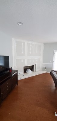 Fireplace TV wall - Metal framed and Drywall finished wall around fireplace for a large TV install . Fireplace TV wall - Metal framed and Drywall finished wall around fireplace for a large TV install .