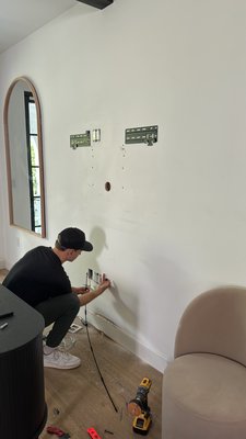 Art TV Mounting - Our special customer Phillip wanted to get an art TV, he is very perfectionist and hates wires sticking all around. We installed everything behind the wall and got him happy.