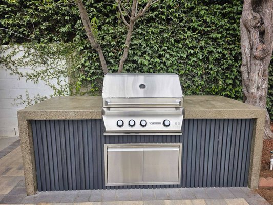 Outdoor Kitchen & BBQ Area Building in Pasadena, CA by BuildCal Landscape - We recently completed a stunning outdoor kitchen building project in Pasadena, CA—perfect for homeowners who love to cook and entertain outside. This custom-designed BBQ area includes a built-in grill, stone countertops, and functional storage space, all built to withstand the Southern California climate.
Our team managed the entire process from design to completion, ensuring durability, beauty, and functionality every step of the way. Whether you're hosting a summer cookout or enjoying a quiet evening outdoors, this BBQ area transforms the backyard into a true outdoor living space.
📍 Serving Pasadena and nearby areas.
📞 Interested in your own custom outdoor kitchen or BBQ space? Contact BuildCal Landscape today at (818) 303-1570 or visit buildcal.com. Outdoor Kitchen & BBQ Area Building in Pasadena, CA by BuildCal Landscape - We recently completed a stunning outdoor kitchen building project in Pasadena, CA—perfect for homeowners who love to cook and entertain outside. This custom-designed BBQ area includes a built-in grill, stone countertops, and functional storage space, all built to withstand the Southern California climate.
Our team managed the entire process from design to completion, ensuring durability, beauty, and functionality every step of the way. Whether you're hosting a summer cookout or enjoying a quiet evening outdoors, this BBQ area transforms the backyard into a true outdoor living space.
📍 Serving Pasadena and nearby areas.
📞 Interested in your own custom outdoor kitchen or BBQ space? Contact BuildCal Landscape today at (818) 303-1570 or visit buildcal.com.