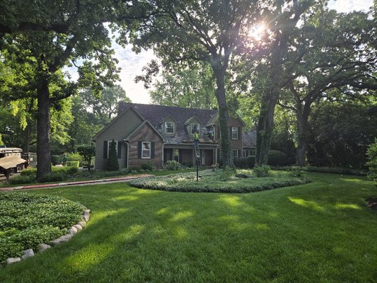 Full Roof Replacement - This beautiful home's roof was in need of some TLC.  The combination of time, harsh Chicagoland climate and being in heavily shaded lot, resulted in their cedar shake roof being covered in algae and rotting as a result.  The homeowner opted for a premium composite cedar shake shingle that gave them the look of authentic cedar shake with the added benefit of zero maintenance. From standard architectural asphalt shingles to composite roofing options, Apex Exteriors has installed beautiful and lasting roofing solutions to the greater Chicagoland market for over 30 years.