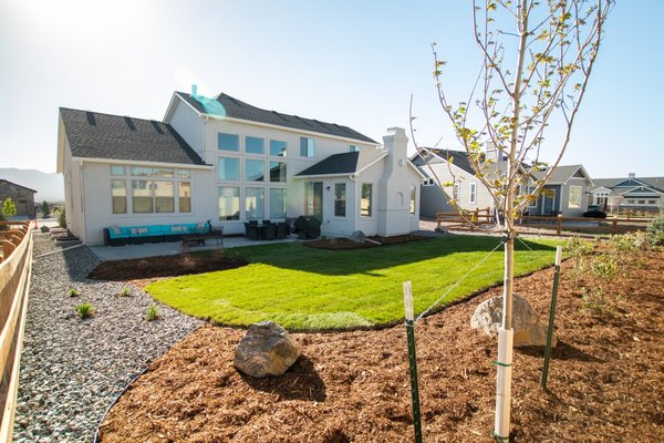 New Build Basics - When the homeowner asked for a budget-friendly, HOA ready design, we were more than happy to oblige! The end result of this project was a yard that can be used any time of the year for all kinds of entertaining while still operating under HOA regulations and providing a low-maintenance setup. A smart irrigation system feeds the generous grass space and garden from the ease of the homeowner’s phone, meaning their outdoor living space will be ready for use whenever they need it. New Build Basics - When the homeowner asked for a budget-friendly, HOA ready design, we were more than happy to oblige! The end result of this project was a yard that can be used any time of the year for all kinds of entertaining while still operating under HOA regulations and providing a low-maintenance setup. A smart irrigation system feeds the generous grass space and garden from the ease of the homeowner’s phone, meaning their outdoor living space will be ready for use whenever they need it.
