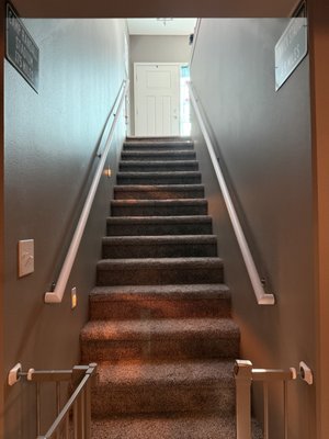 Interior Railing Install - These clients were in need of some railing on their staircase to ensure their safety while using the stairs. There railings were custom built in house and painted to match their existing trim!