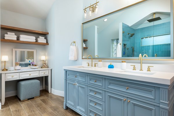 Winter Garden bathroom remodel - This master bathroom was completely reimagined to create a more open, luxurious, and functional layout. We relocated the  tub to the right wall and transformed the original tub area into a spacious walk-in shower. We also moved the double vanity to a single wall, maximizing the flow of the room and creating a bright, open-concept design. The project was completed with premium finishes, custom tile work, and thoughtful details that turned the space into a modern spa-like retreat.
