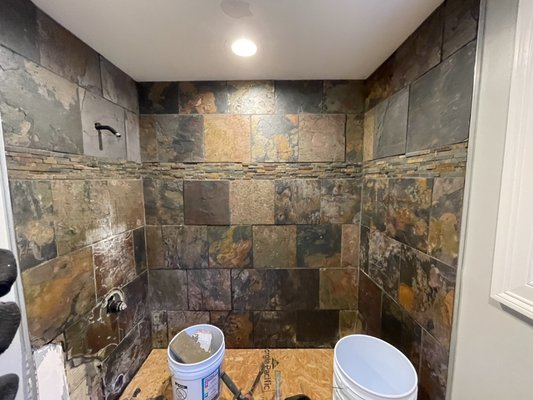 Bathroom remodel - Client couldn’t live with the old slate tile design any longer. Gave me a call and just wanted something to brighten up the bathroom. Wanted a more modern and relaxing atmosphere. We installed a new rain shower head with a hand spray and tub spout combo kit. A big custom niche with marble basket weave accent. A simple but yet elegant design with wolf gray and matte black color scheme. Bathroom remodel - Client couldn’t live with the old slate tile design any longer. Gave me a call and just wanted something to brighten up the bathroom. Wanted a more modern and relaxing atmosphere. We installed a new rain shower head with a hand spray and tub spout combo kit. A big custom niche with marble basket weave accent. A simple but yet elegant design with wolf gray and matte black color scheme.