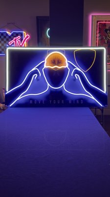 Custom 18" x 30" Neon Acrylic Print - We created this stunning custom neon piece for a walk-in client. The artwork titled 'Move Your Mind' merges intricate LED illumination with clean, modern lines to evoke a sense of focus and creativity.
The print, measuring 18" x 30", is mounted on high-quality acrylic, ensuring durability and a sleek, polished look. Our team worked closely with the client to bring their vision to life, blending bold visuals with a minimalist touch for a truly unique final product Custom 18" x 30" Neon Acrylic Print - We created this stunning custom neon piece for a walk-in client. The artwork titled 'Move Your Mind' merges intricate LED illumination with clean, modern lines to evoke a sense of focus and creativity.
The print, measuring 18" x 30", is mounted on high-quality acrylic, ensuring durability and a sleek, polished look. Our team worked closely with the client to bring their vision to life, blending bold visuals with a minimalist touch for a truly unique final product
