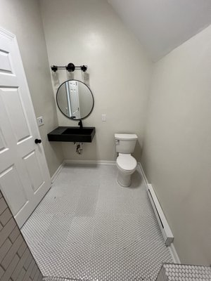Attic Renovation and Bathroom Addition/Remodel - This renovation was an unfinished attic, we framed in new walls dividing the space. Ran new plumbing and electric. Installed a custom shower stall and bathroom. Sherwin Williams showcase paint.