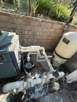 Entire System Replumbing - This old plumbing system was pulling in a lot of air through all the old valves and unions. We tore down the whole plumbing and redid it from scratch.