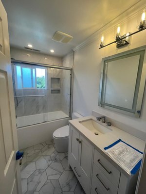 Clayton Two and a Half Bath Remodel - Transformed a dated Clayton home into a modern haven with this stunning 2.5-bath remodel! We worked closely with the homeowners to bring their vision to life, blending functionality with timeless style. From sleek finishes to thoughtful layouts, every detail was crafted with care to elevate daily living. The result? A space that’s both practical and inviting, perfectly suited to their lifestyle.