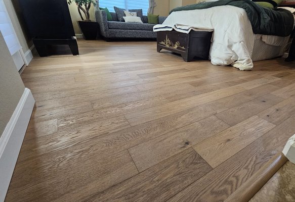 Cachemira Hardwood - This was an upgrade to add home value by replacing carpeting in multiple rooms with glue down hardwood. It included the addition of area rugs to finish the look. Many homeowners in Arizona are moving away from carpet and into hard surfaces. Cachemira Hardwood - This was an upgrade to add home value by replacing carpeting in multiple rooms with glue down hardwood. It included the addition of area rugs to finish the look. Many homeowners in Arizona are moving away from carpet and into hard surfaces.