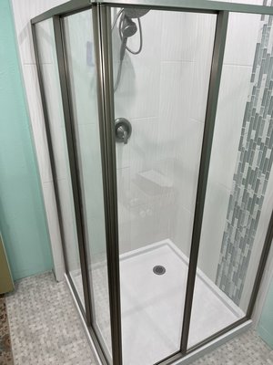 Napa Shower Remodel 2024 - This remodel was done involving setting up shower pan over existing drain connection, installing tile backer boards, waterproofing, installing Spanish tiles with glass tile accent. Has Kohler fixtures, and French corner shower doors. Napa Shower Remodel 2024 - This remodel was done involving setting up shower pan over existing drain connection, installing tile backer boards, waterproofing, installing Spanish tiles with glass tile accent. Has Kohler fixtures, and French corner shower doors.