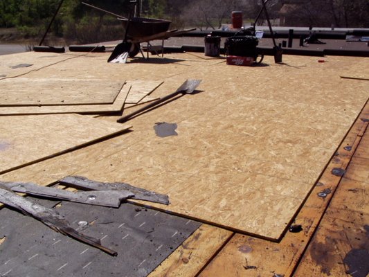 Modified Bitumen flat roof - This was an apartment complex that had a leaking flat roof. We tore off all of old roofing, installed new decking, and modified bitumen roof. Modified Bitumen flat roof - This was an apartment complex that had a leaking flat roof. We tore off all of old roofing, installed new decking, and modified bitumen roof.