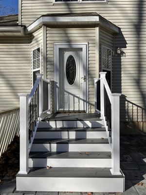 Backyard Patio and Deck - Customer bought stones and went about it himself before realizing they couldnt. We tore out pavers and laid down over 1000sqft. After which we built a mini deck, stairs, and Paver steps.
